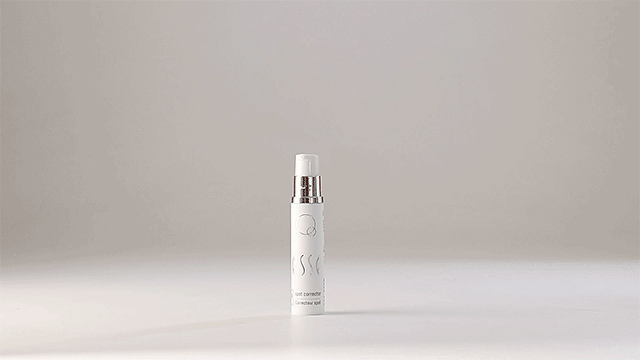 An animated GIF showcases the Esse Clarifying Cleanser, a white cylindrical spray bottle, set against a plain background. The bottle rotates 360 degrees, revealing its branding and text. A puff of mist is dispensed from the nozzle, demonstrating its spray function.